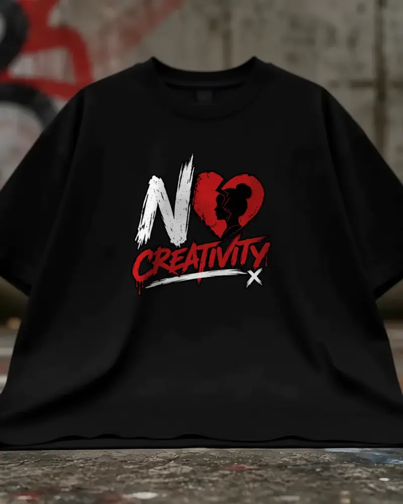 Concept mockup: black oversized tee with NO CREATIVITY logo on the chest